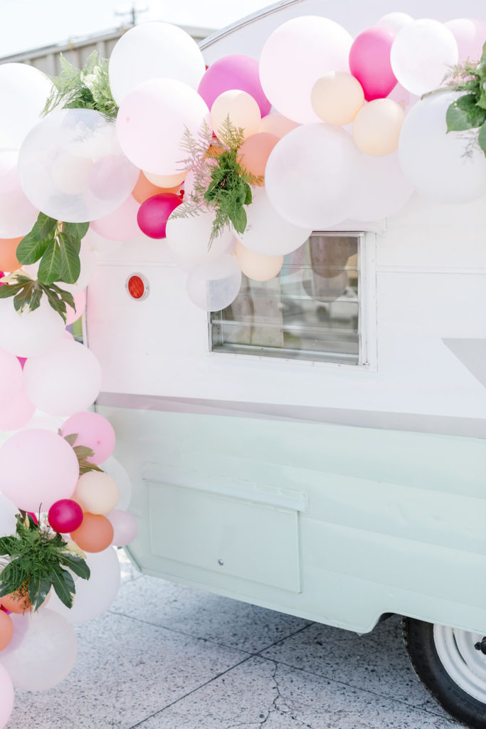 Pastel Balloon Arch with Flowers
